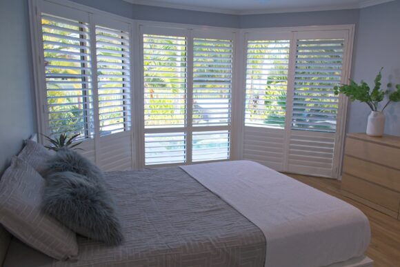 Luxury,white,indoor,plantation,shutters,in,bedroom, ,selective,focus